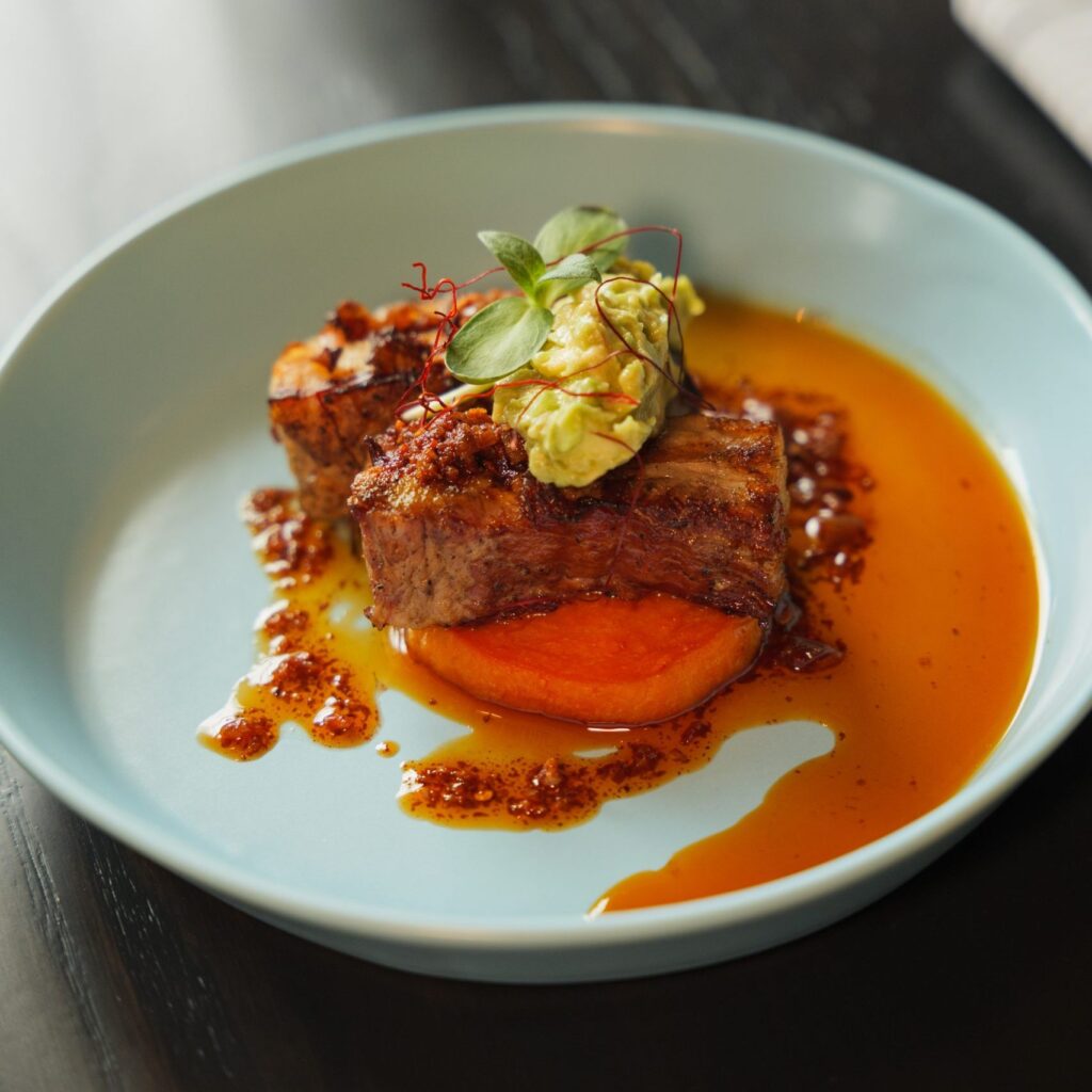 food on a plate on a wooden table
